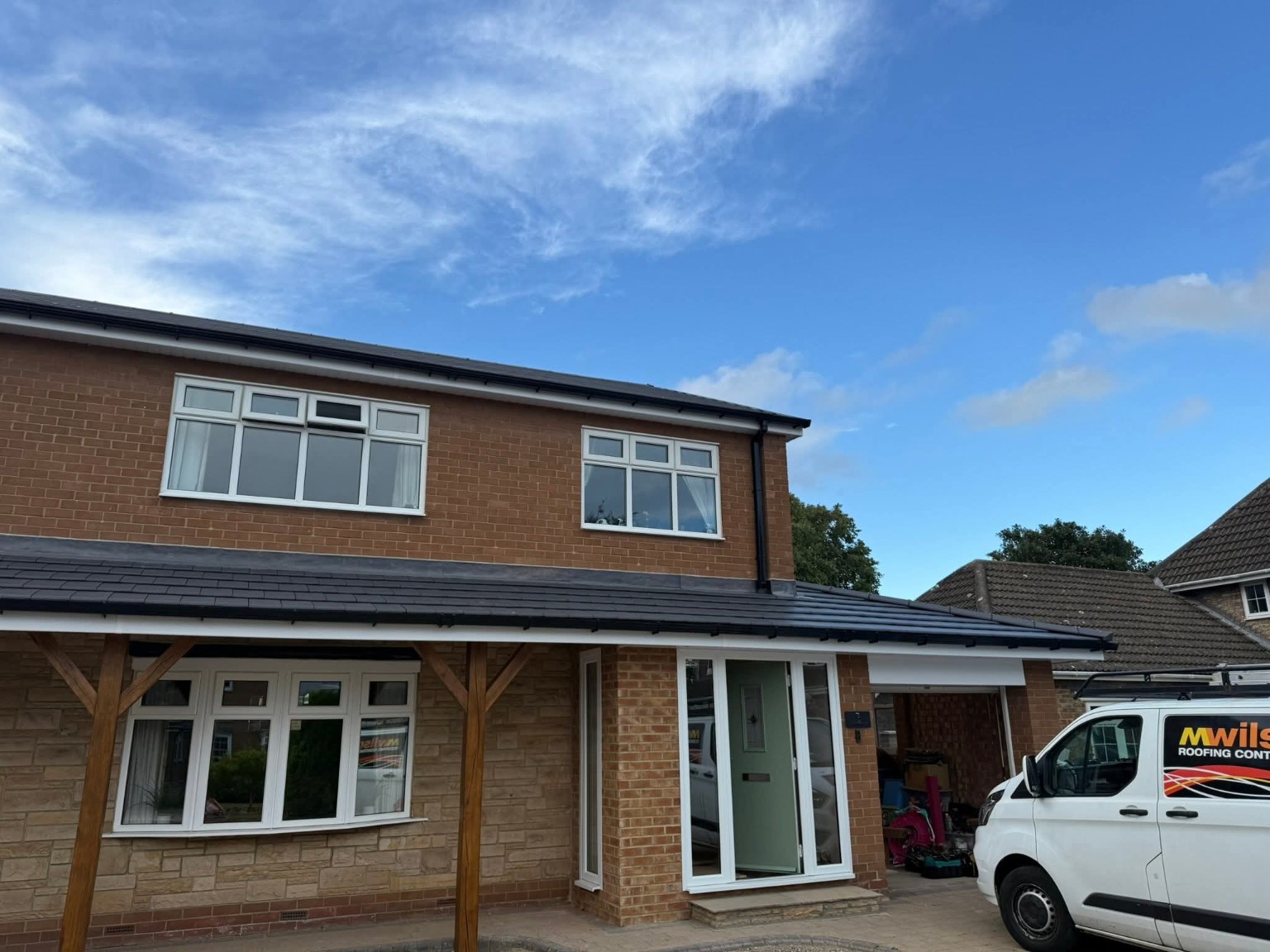M Wilson Roofing Contractors - Roofing and front elevation